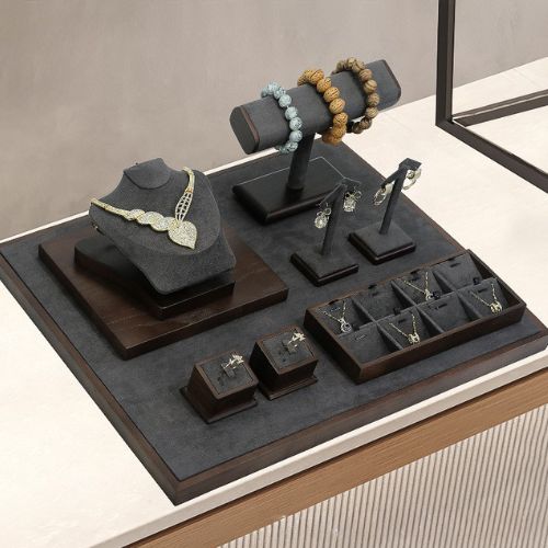 Gray wooden jewelry display